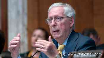 Grinning Mitch McConnell, 84, poses in new 'proof of life' photo with wife Elaine... but still not a single word in 44 days