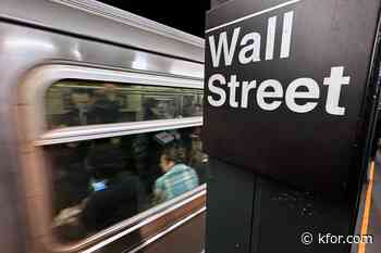 Stocks waver on Wall Street and crude oil prices drop 5% as Mideast tensions cool