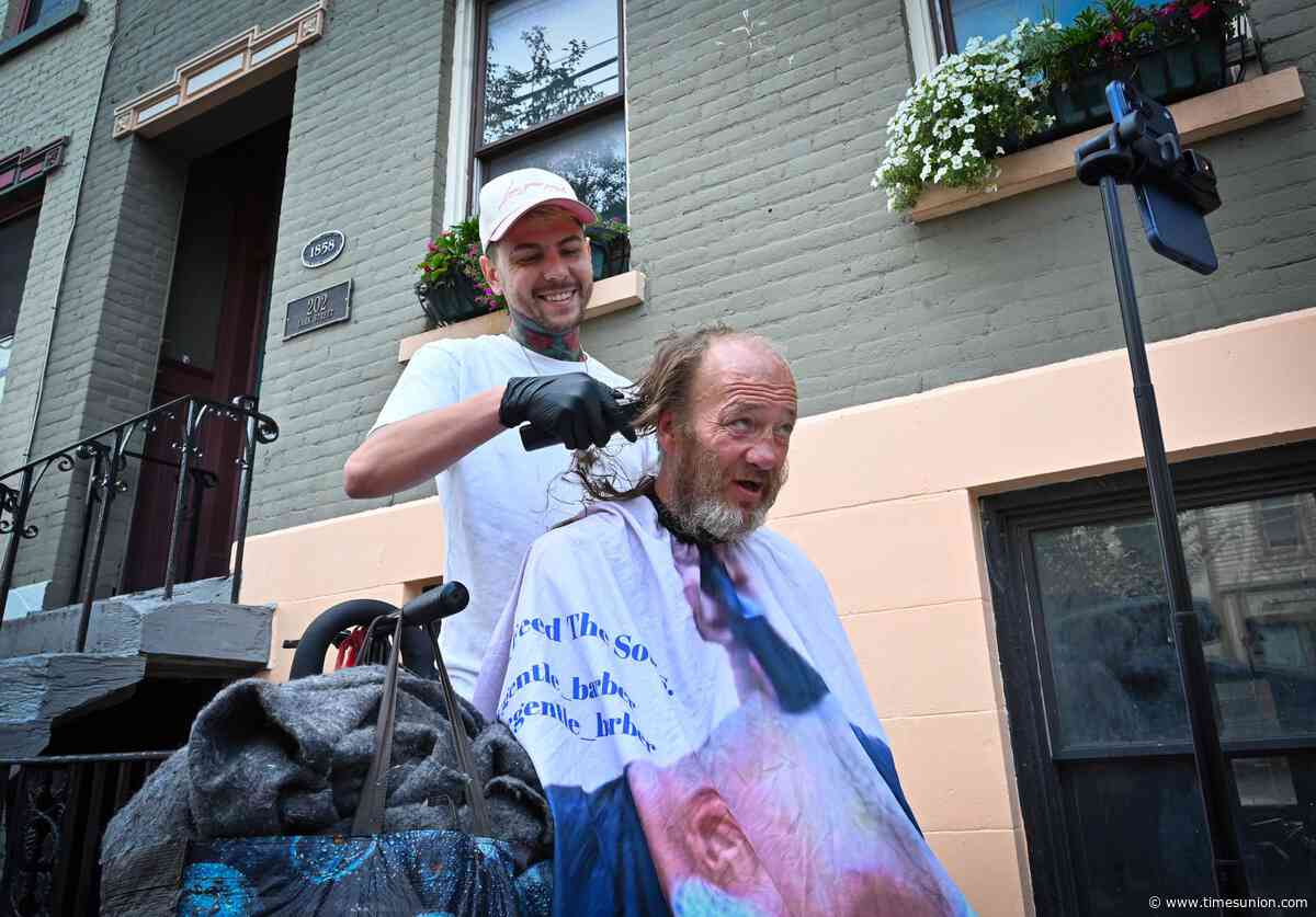 'Gentle Barber' stops in Albany to give haircuts to homeless