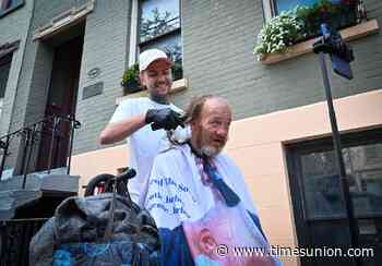 ‘Gentle Barber’ stops in Albany to give haircuts to homeless