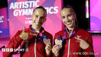 Identical twins win gymnastics medals on same day