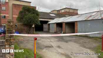 Man denies murder after body found in garage fire