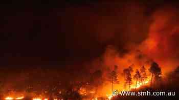 Wildfires tear across France