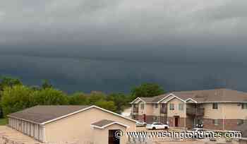 Wisconsin tornado causes extensive damage and cuts power to thousands of homes