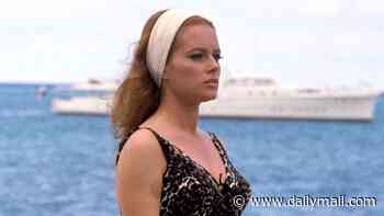 Bond girl assassin Luciana Paluzzi still has signature scarlet hair at 89… see her now on glamorous rare outing