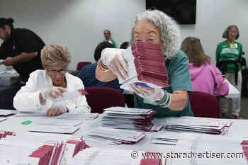 Volunteers vouch for process as first ballots counted