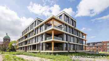 Houten woongebouw van KOW introduceert natuurlijk stedelijk leven bij herontwikkeling ziekenhuisterrein