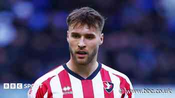 Rochdale bring in ex-MK Dons defender Sherring