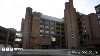 Head teacher denies taking child abuse image