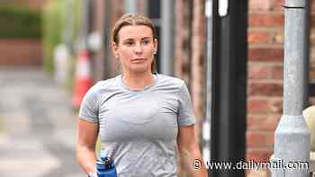Coleen Rooney shows off her gym-honed figure in tight exercise gear as she steps out after working out
