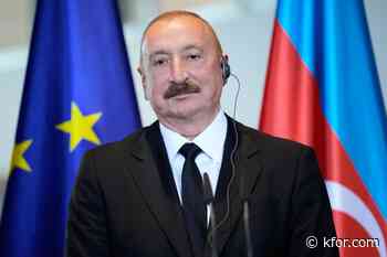 Azerbaijan court convicts 9 journalists and activists in a case seen as an attack on media freedom