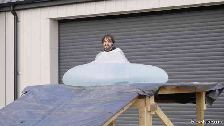Man rolls downhill in giant water balloon in glorious slow motion