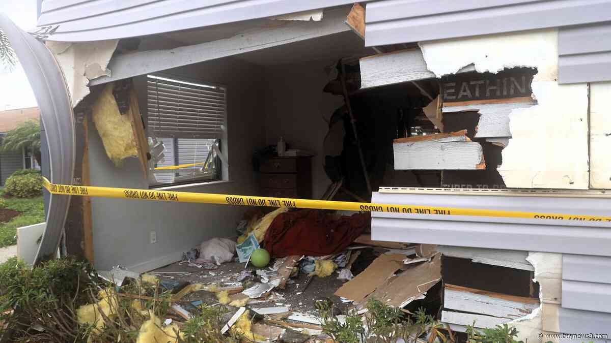 Hillsborough fire crews respond after vehicle crashes into 2 apartment buildings
