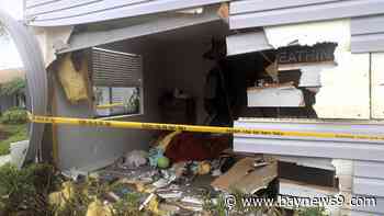 Hillsborough fire crews respond after vehicle crashes into 2 apartment buildings