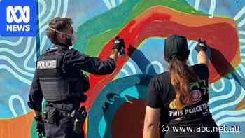 Mural paints story of community's hope of turning tide on crime