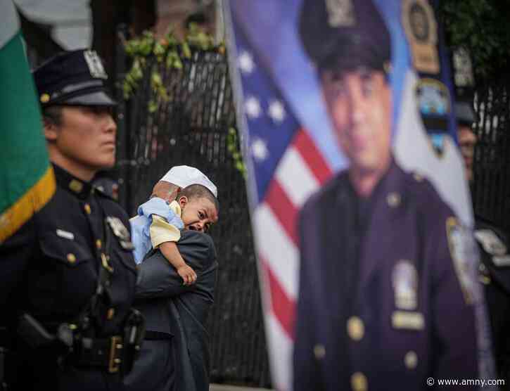 Bronx cop killed in Midtown mass shooting honored at vigil on anniversary of his murder