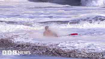 Bystander video shows teen lifeguard's dramatic ocean rescue
