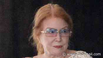 70s TV actress who also starred in The Hangover franchise enjoys rare Los Angeles outing... can you guess who?