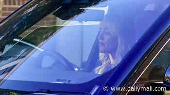 Downcast Jackie 'O' Henderson is seen for the first time in weeks and reveals a noticeably plumper pout after a trip overseas - as her former co-host Kyle Sandilands launches his new show