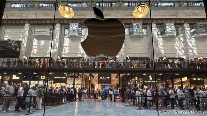 Apple valuation briefly tops $5tn with surge in iPhone demand