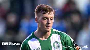 Grimsby sign two as captain Green extends deal