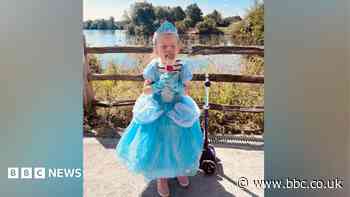 Girl completes scoot for friend with rare condition