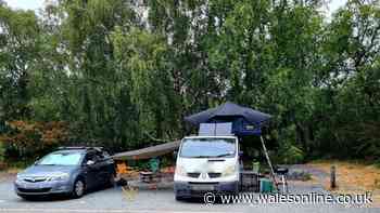 Campervan hogs four spaces at popular Welsh lake sparking fury