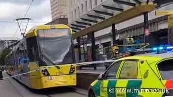 Manchester live: Man 'trapped by tram' suffers possible life-changing injuries