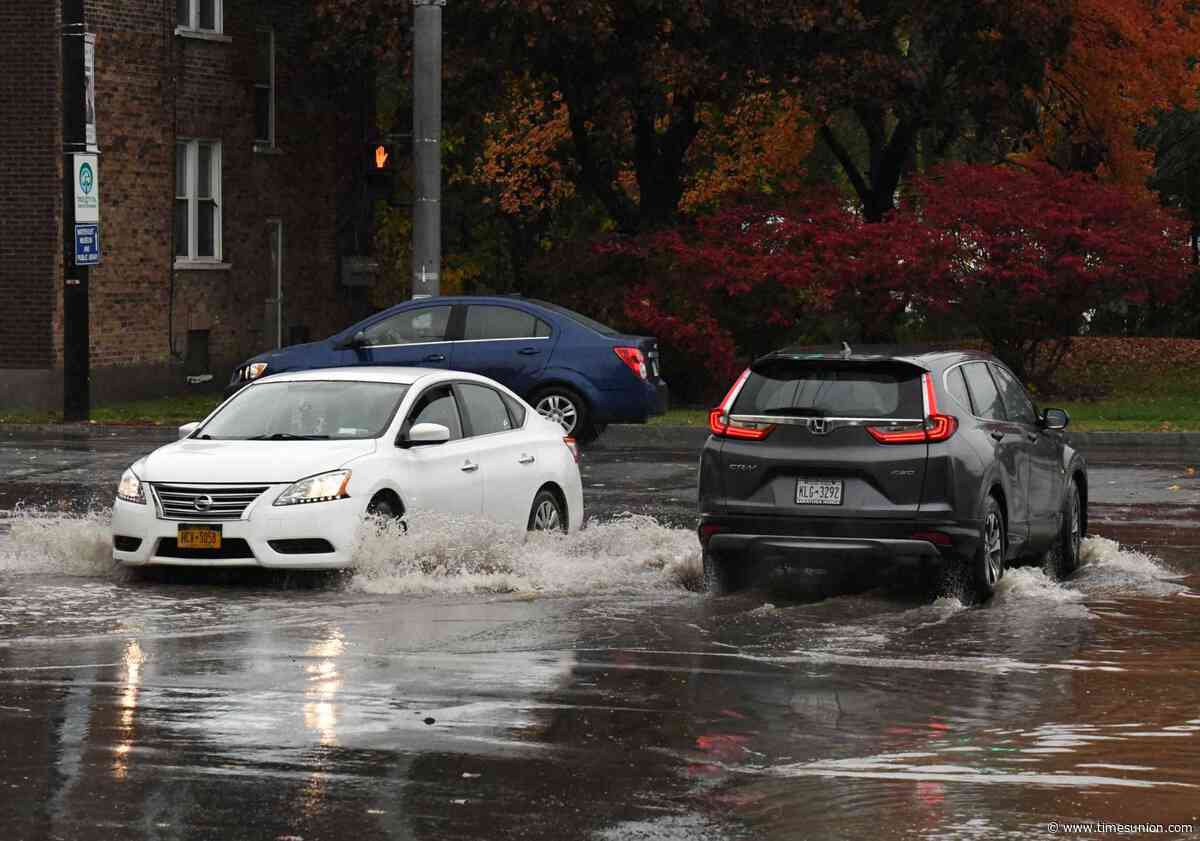 Live: People urged to stay off roads 'unless fleeing an area subject to flooding'
