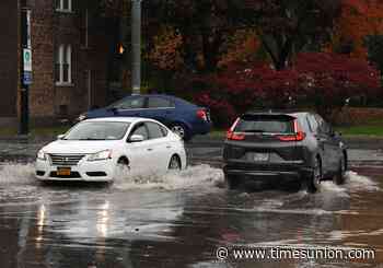 Live: People urged to stay off roads 'unless fleeing an area subject to flooding'