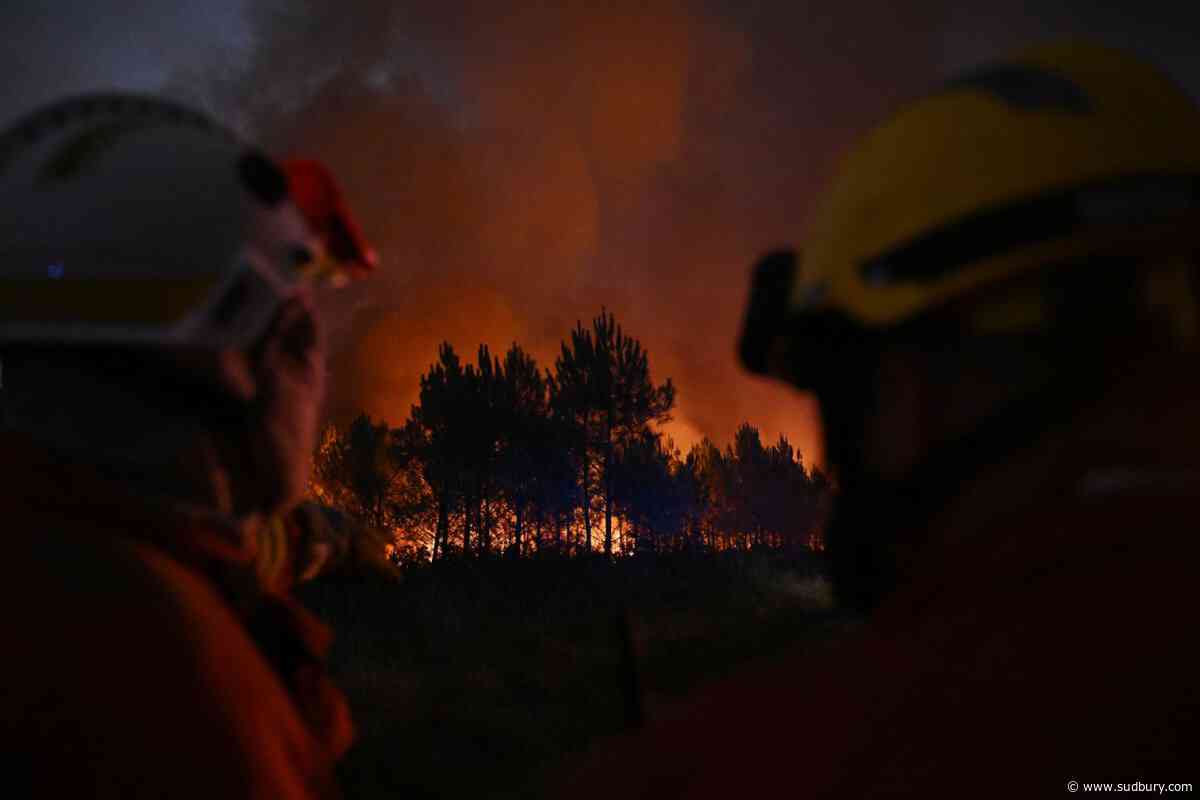 France battles wildfire four times the size of Paris as 40 C heat threatens new surge