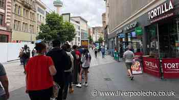 Massive queues form on Liverpool city centre street