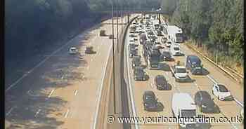 LIVE updates as lorry and car crash on M25 causes heavy congestion, closes lane