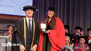 Swimmer honoured for improving athlete welfare