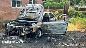One person injured after car destroyed in fire