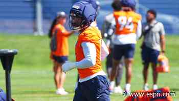 Broncos LB Cooper practices amid legal troubles