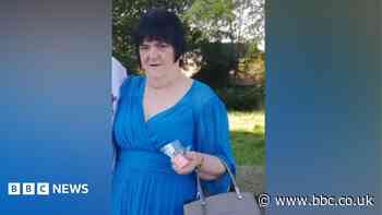 Family pays tribute to woman found dead in flat