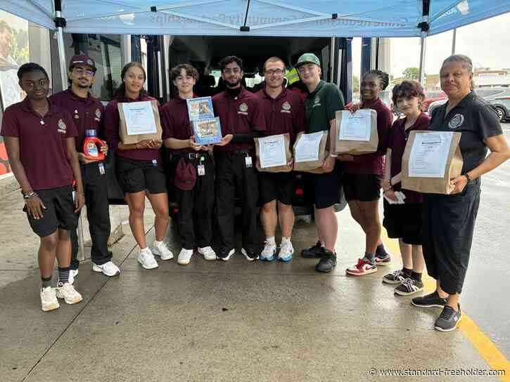 Cornwall police Youth in Policing Initiative members brave the rain to support Centre 105