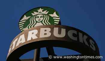 Starbucks reports strong quarterly sales and raises annual outlook