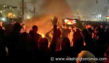 Iran hangs two men accused of attacking police during widespread protests in January