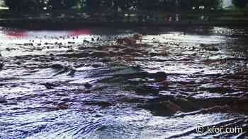 Drivers work to block traffic during water main break until crews arrived