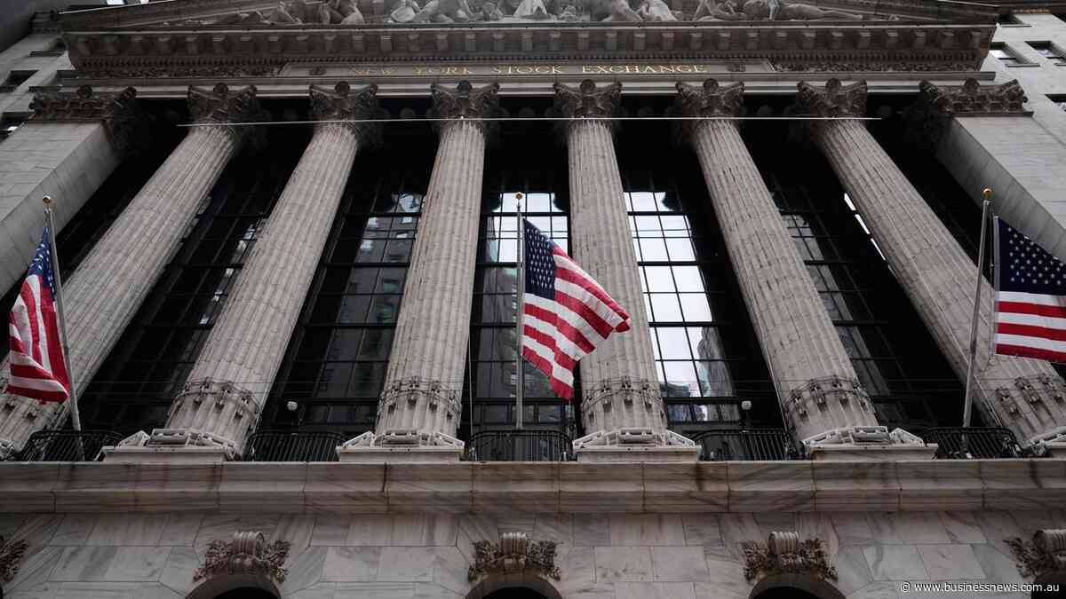 Wall Street closes down sharply after Fed holds rates