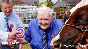 Former farmer, aged 99, fulfils wish to lead cow at show one more time