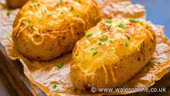 Baked potatoes will taste better if coated in 1 everyday ingredient before cooking them