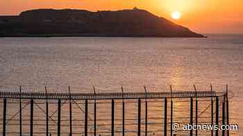 Hundreds of migrants swim from Morocco to the Spanish territory of Ceuta
