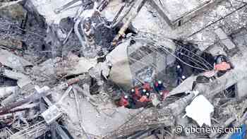 Rescuers search for survivors after a 7.1 quake kills 18 in southwestern Japan