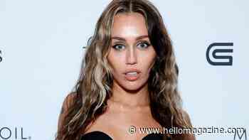 Miley Cyrus is a heatwave goddess in plunging lace and leather trousers