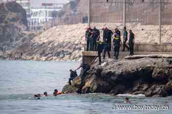 Ceuta asks Madrid to declare a national emergency as thousands cross into the Spanish territory