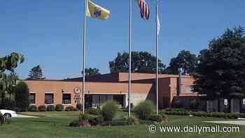 Married female prison guard had affair with inmate and worried baby would be different race to her husband when she had pregnancy scare, feds say