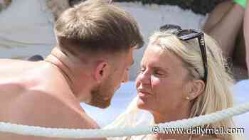 Bikini-clad Kerry Katona and her boyfriend Paolo Margaglione live it up at a beach club in Marbella after confirming she's moving to Spain
